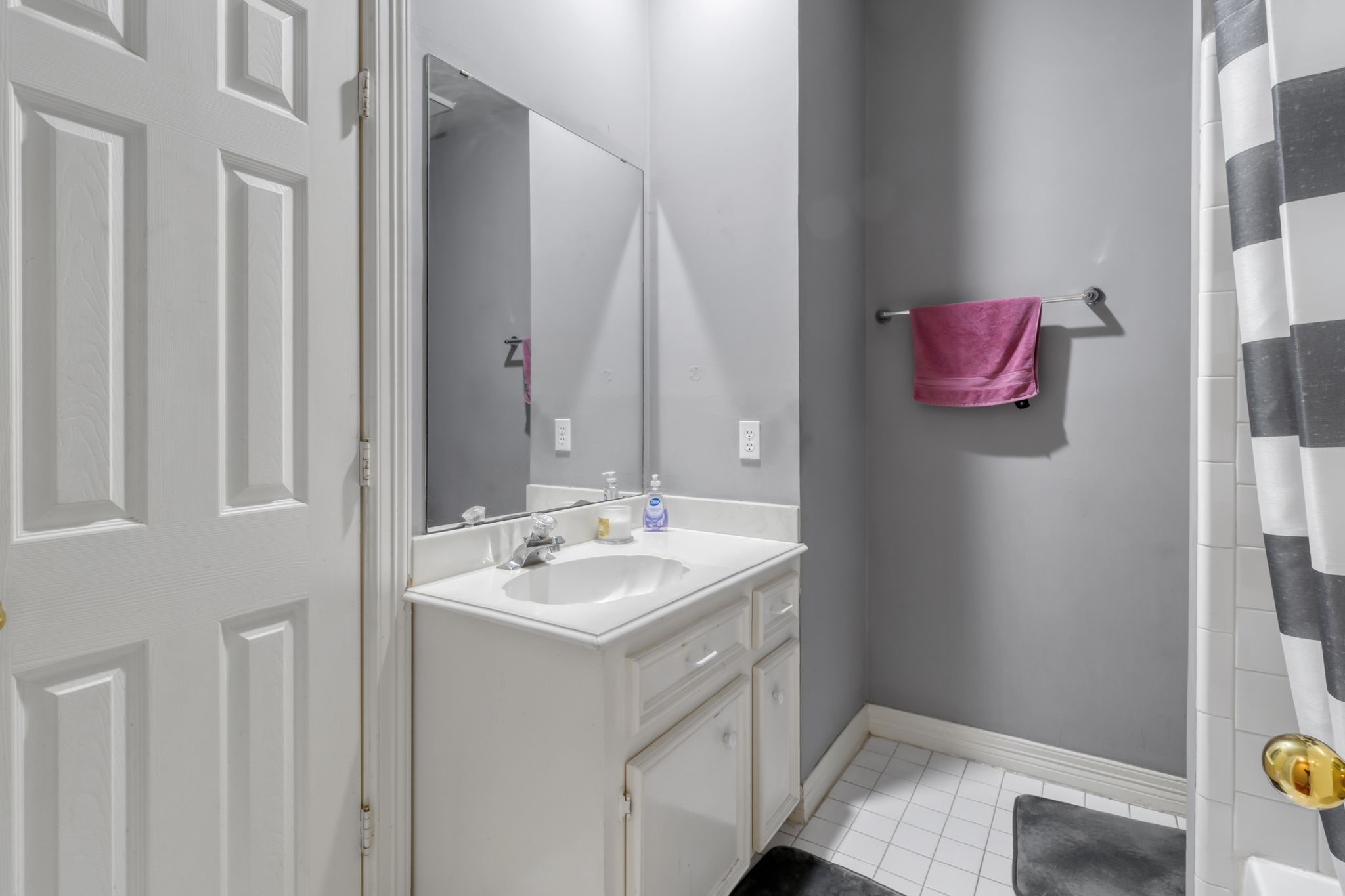18106 Briden Oak Court Spring, TX 77379 - Photo 21 of 31 a bathroom with a sink and a mirror