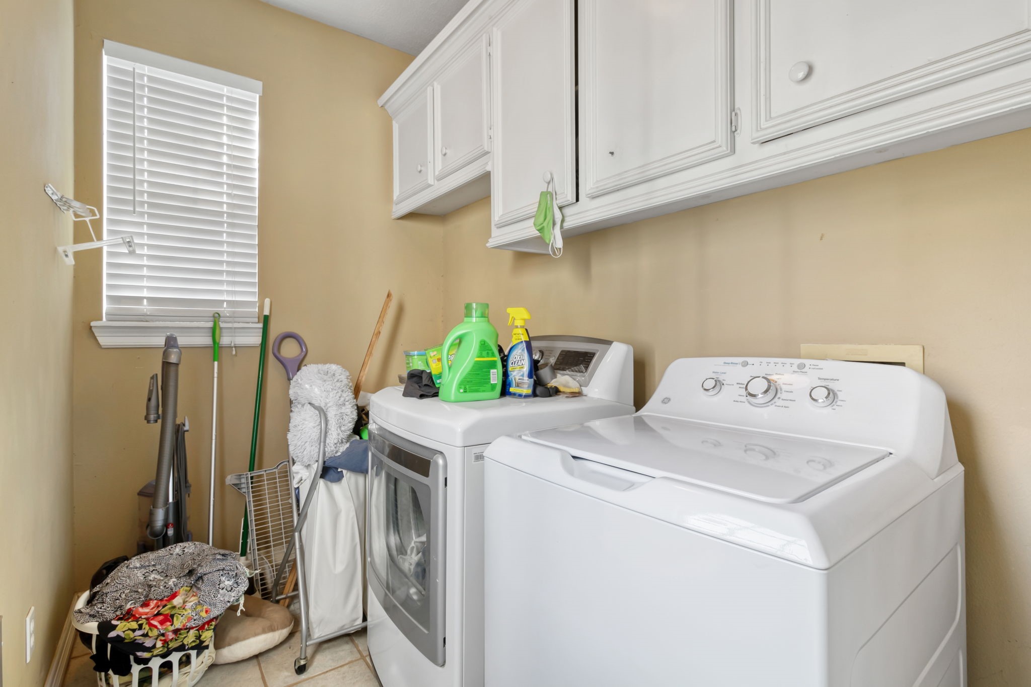 18106 Briden Oak Court Spring, TX 77379 - Photo 23 of 31 a utility room with dryer and washer