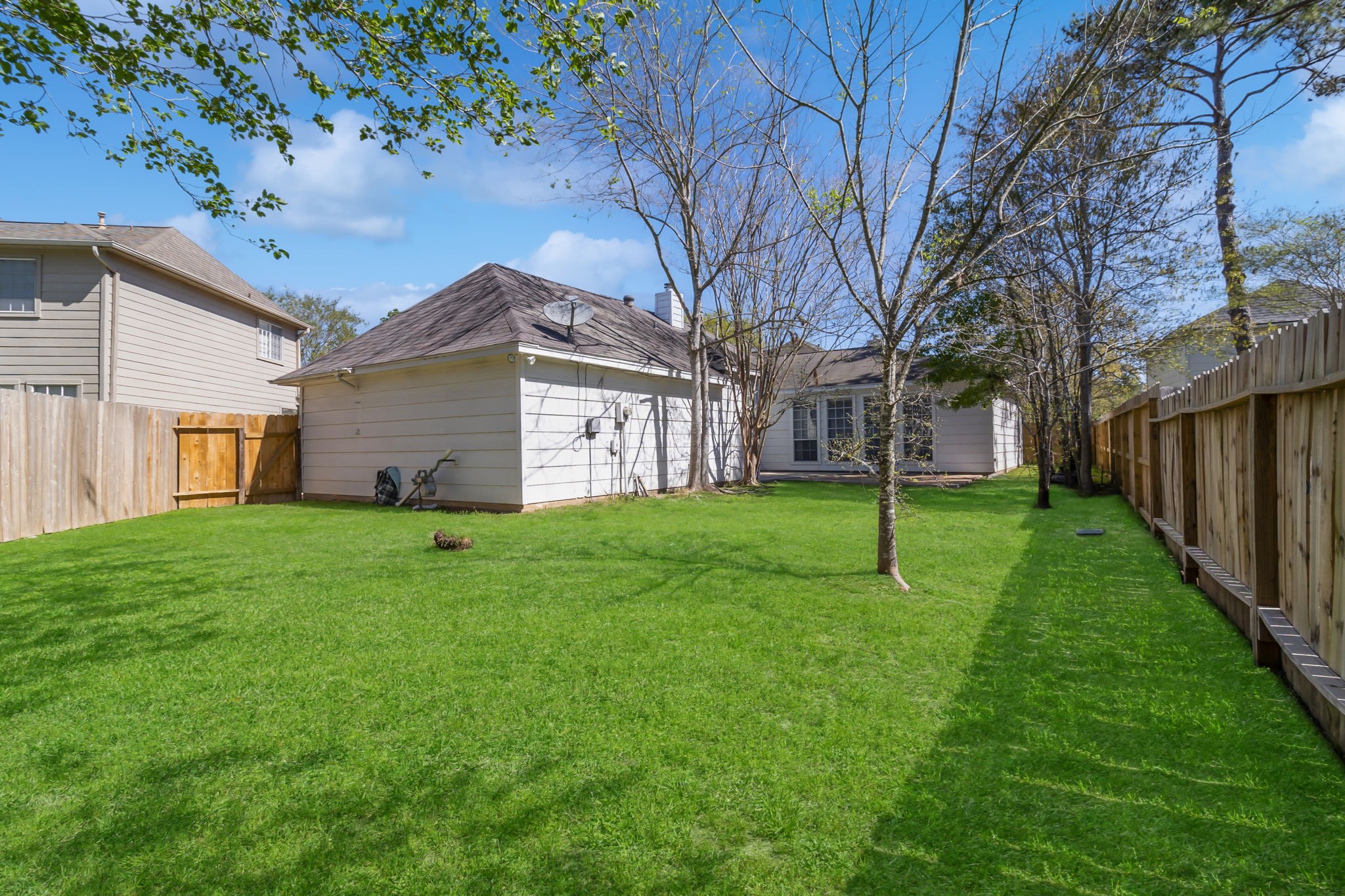 18106 Briden Oak Court Spring, TX 77379 - Photo 27 of 31 a view of a house with a yard