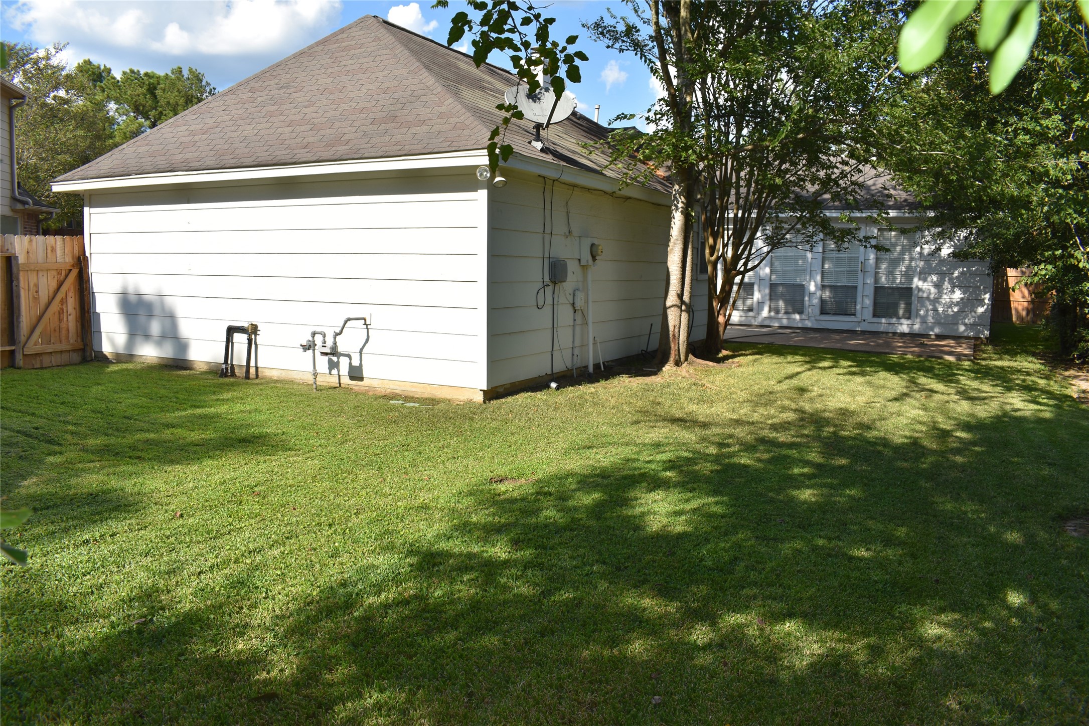 18106 Briden Oak Court Spring, TX 77379 - Photo 29 of 31 a view of a house with a yard