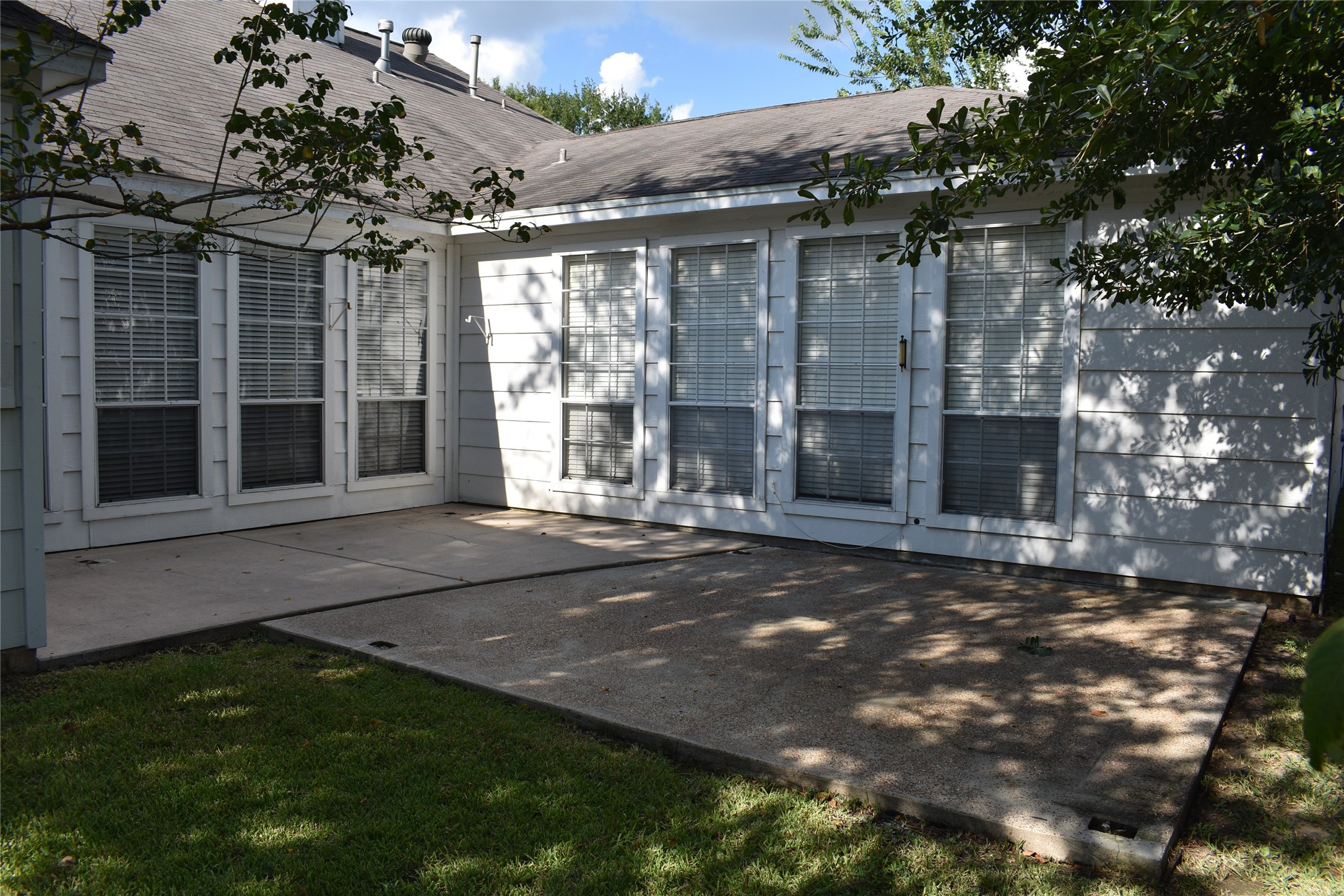 18106 Briden Oak Court Spring, TX 77379 - Photo 30 of 31 a view of a house with a yard
