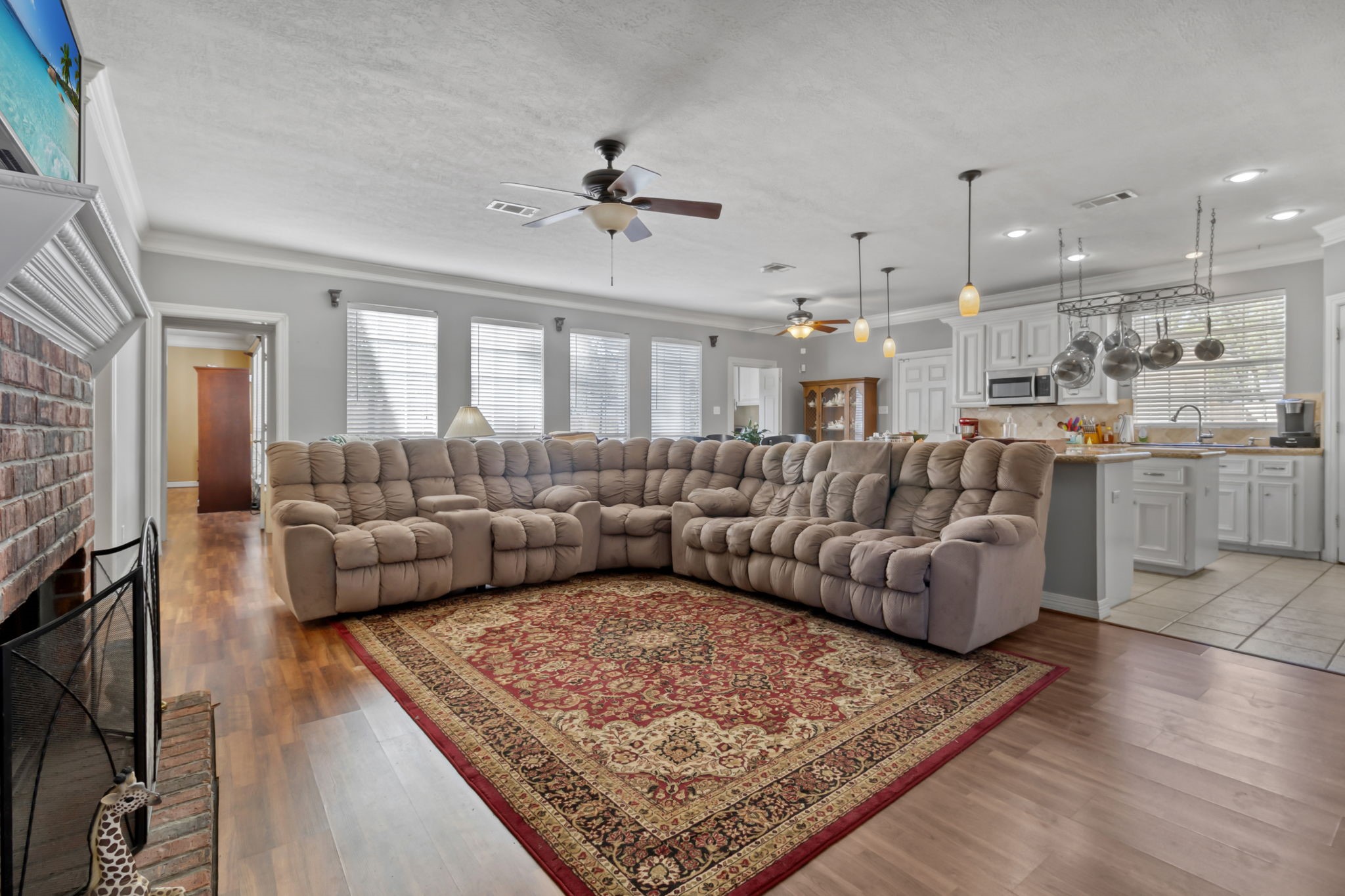 18106 Briden Oak Court Spring, TX 77379 - Photo 7 of 31 a living room with furniture and a fireplace