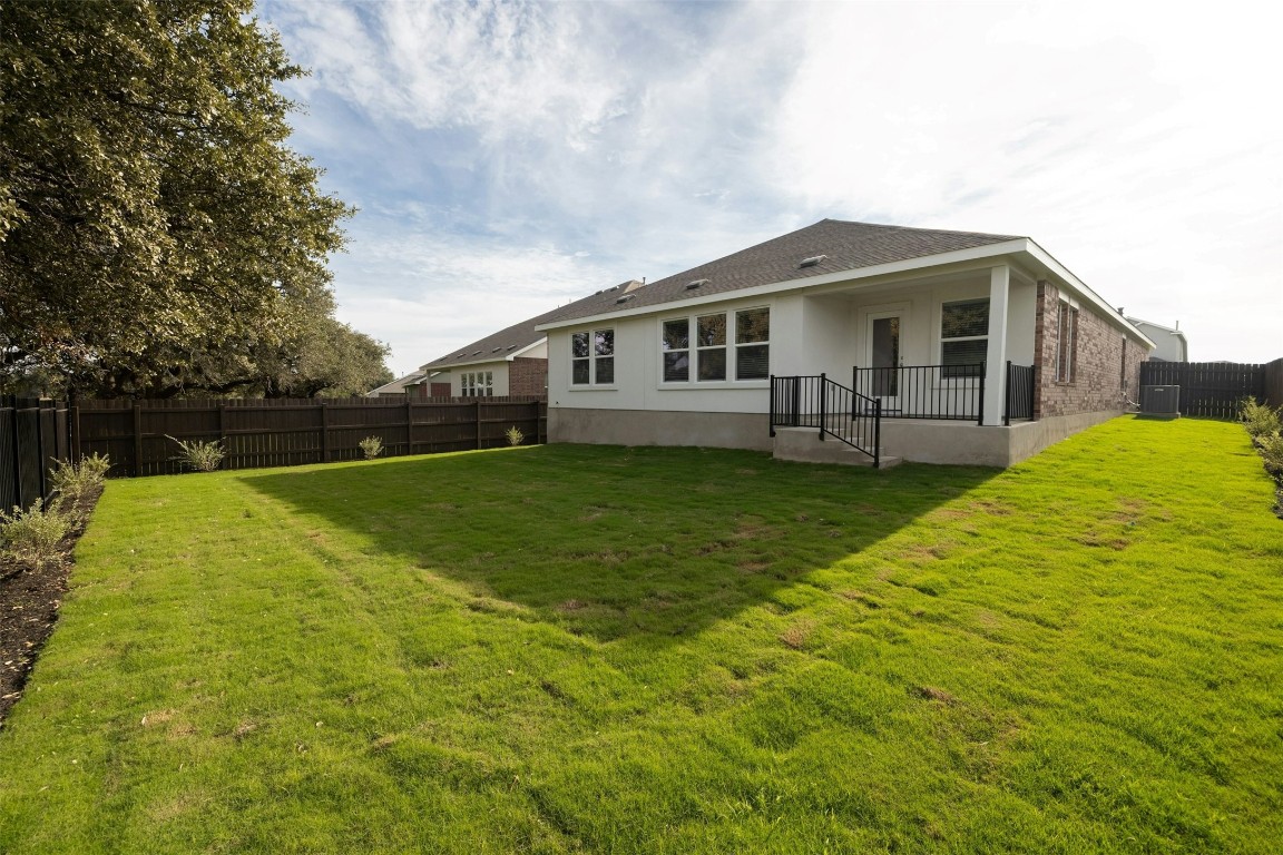 1804 Boggy Crk Rnch Road Georgetown, TX 78628 - Photo 28 of 28 a front view of a house with yard and green space