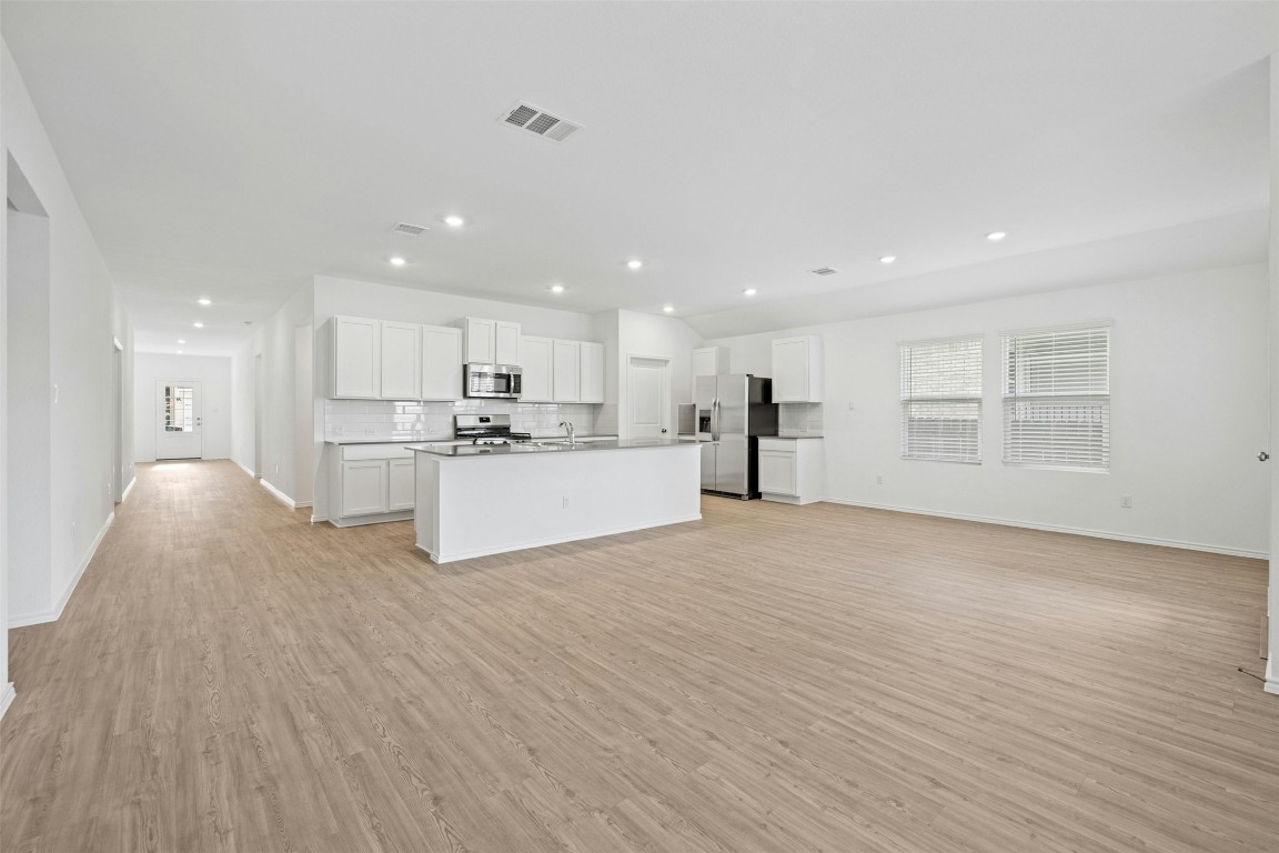 1804 Boggy Crk Rnch Road Georgetown, TX 78628 - Photo 6 of 28 a view of kitchen with wooden floor and windows