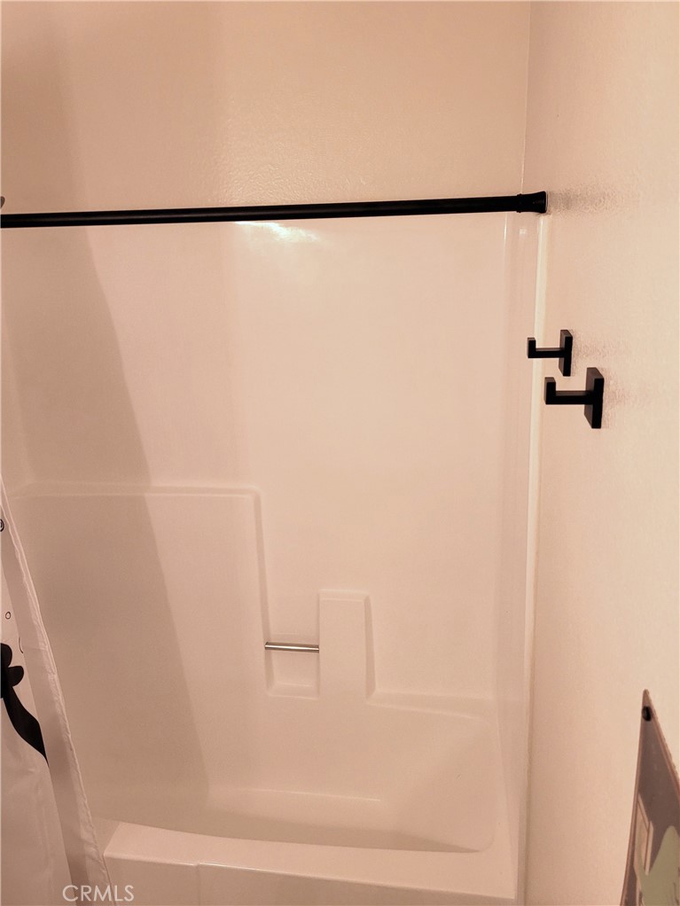 28162 Sloan Canyon Road, Unit A Castaic, CA 91384 - Photo 20 of 30 a bathroom with a shower