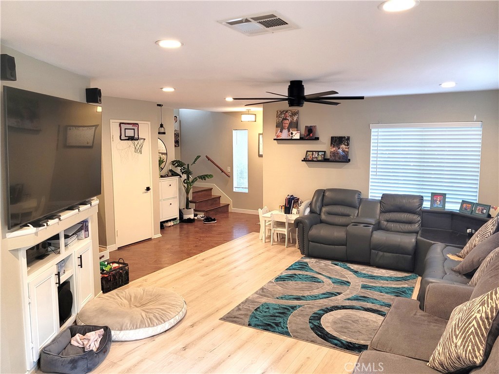 28162 Sloan Canyon Road, Unit A Castaic, CA 91384 - Photo 2 of 30 a living room with furniture and a flat screen tv