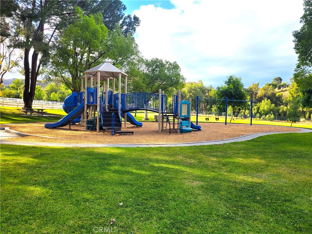28162 Sloan Canyon Road, Unit A Castaic, CA 91384 - Photo 29 of 30 a view of a park with swings and slides