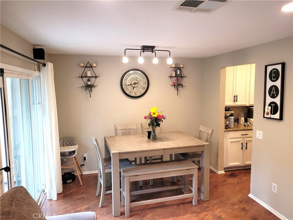 28162 Sloan Canyon Road, Unit A Castaic, CA 91384 - Photo 3 of 30 a view of dining table and chairs in a room