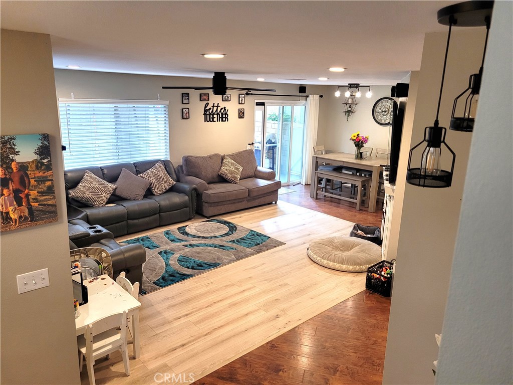 28162 Sloan Canyon Road, Unit A Castaic, CA 91384 - Photo 5 of 30 a living room with furniture and wooden floor