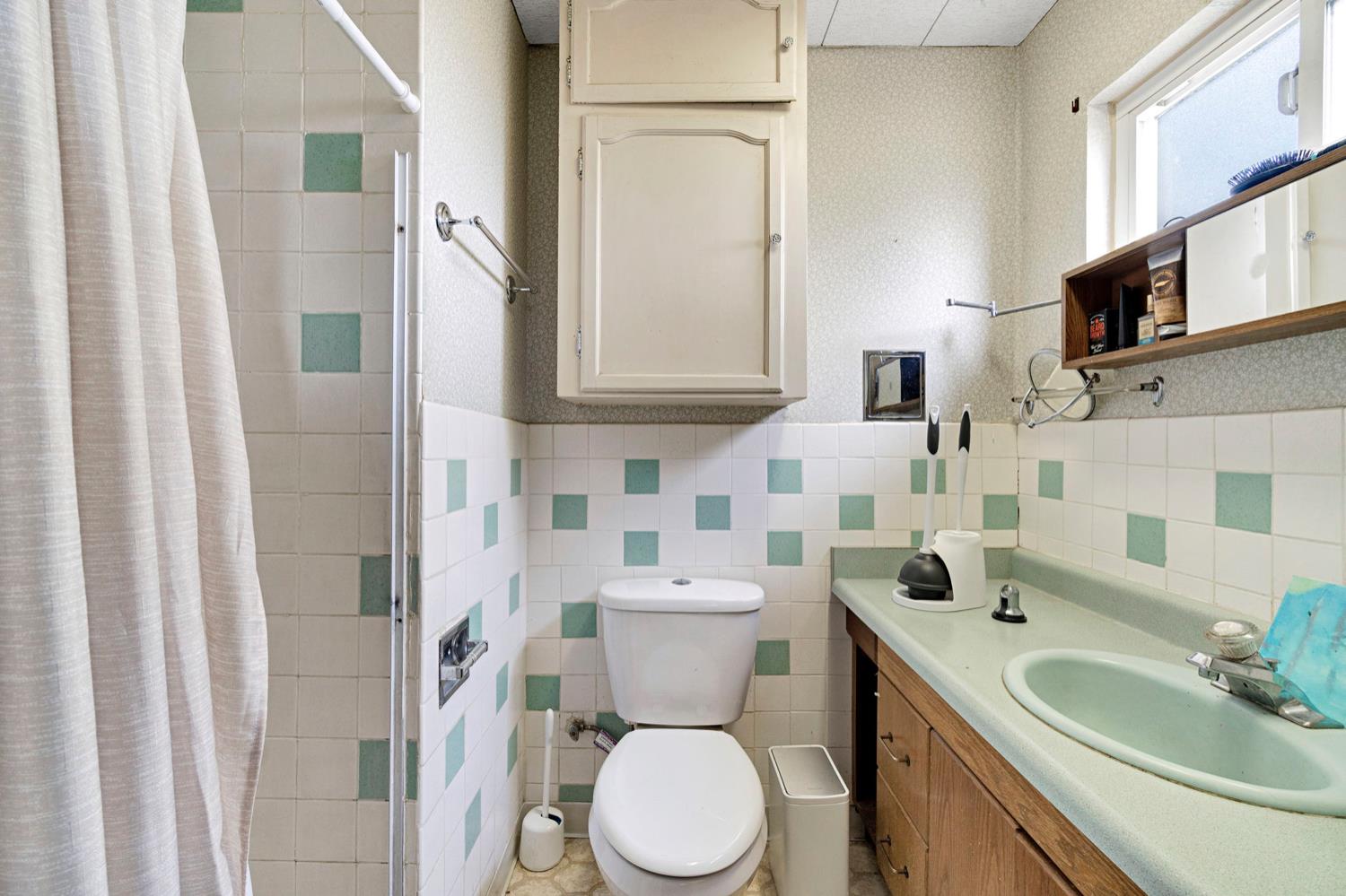 17810 Road 26 Madera, CA 93638 - Photo 15 of 39 a bathroom with a toilet sink and mirror