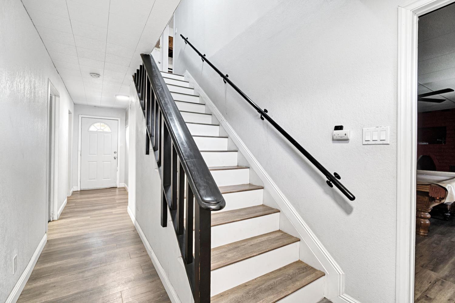 17810 Road 26 Madera, CA 93638 - Photo 16 of 39 a view of entryway and gallery with wooden floor