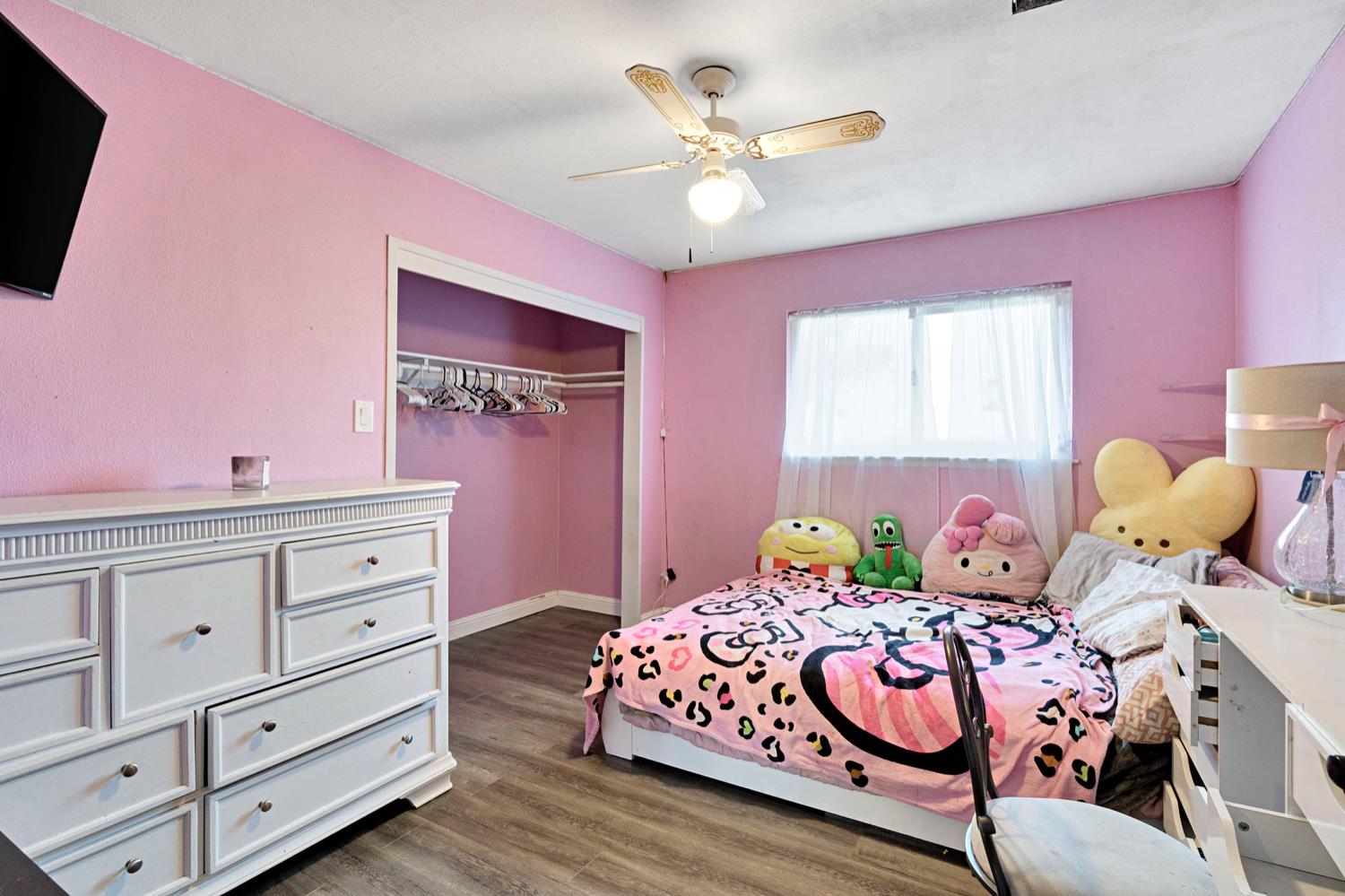 17810 Road 26 Madera, CA 93638 - Photo 9 of 39 a bedroom with a bed and dresser