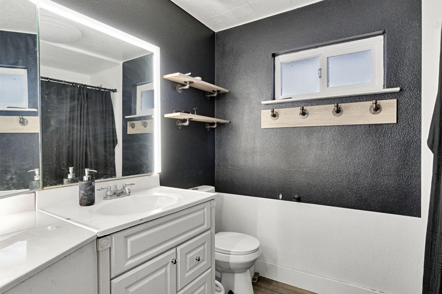 17810 Road 26 Madera, CA 93638 - Photo 10 of 39 a bathroom with a sink toilet and shower