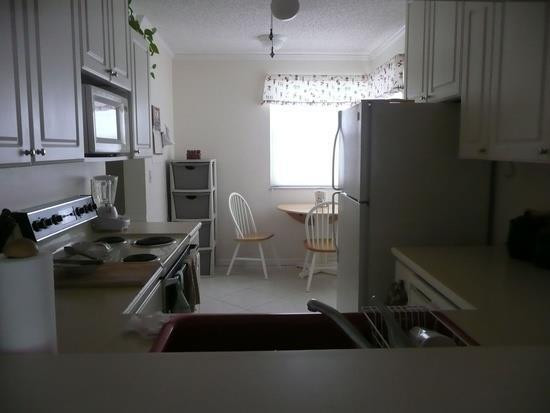 9642 West McNab Road, Unit 201 Tamarac, FL 33321 - Photo 4 of 7 Kitchen
