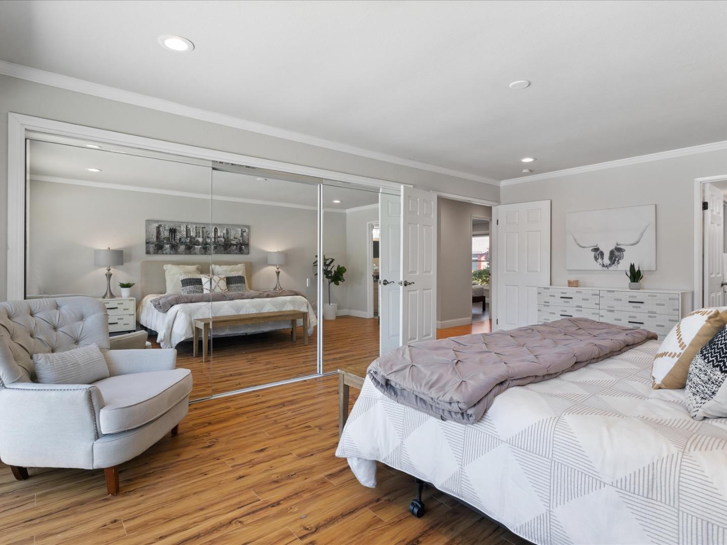 821 Pinehurst Place San Ramon, CA 94583 - Photo 18 of 26 a spacious bedroom with a bed and a couch