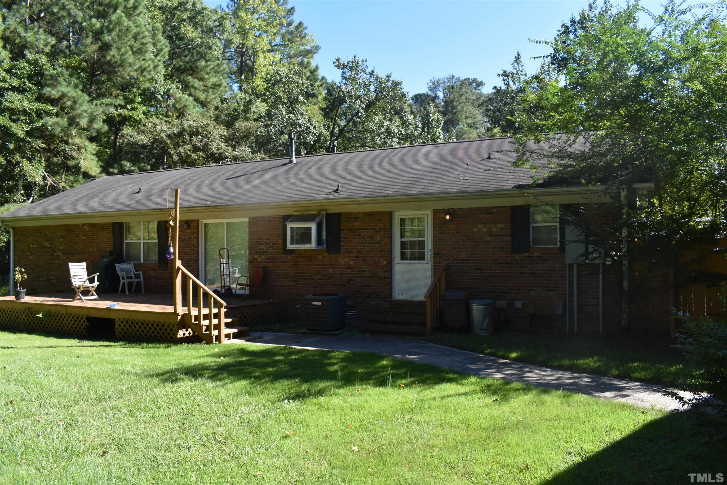 4001 Blackard Pond Road Raleigh, NC 27604 - Photo 2 of 8 a view of a house with backyard porch and garden