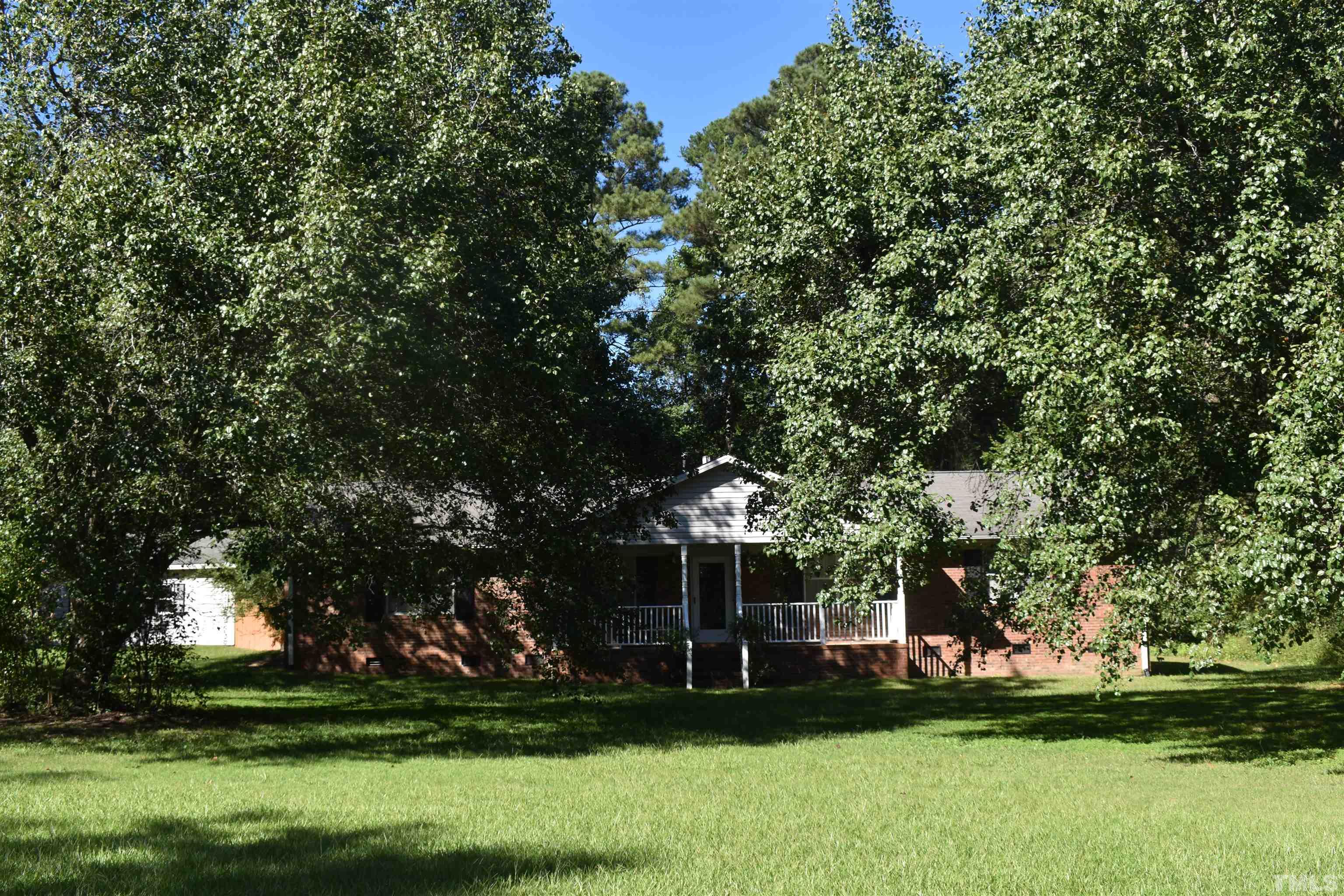 4001 Blackard Pond Road Raleigh, NC 27604 - Photo 4 of 8 a front view of a house with a yard