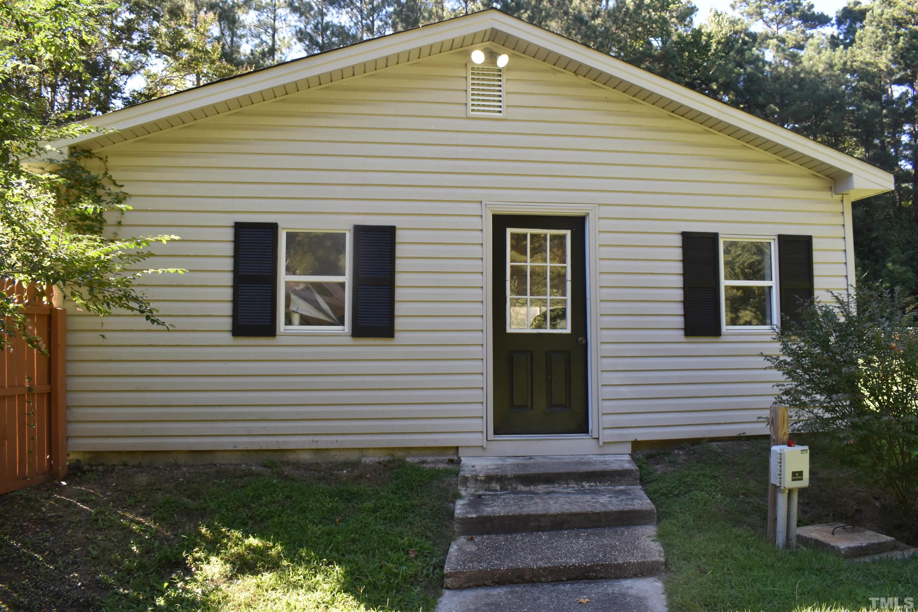 4001 Blackard Pond Road Raleigh, NC 27604 - Photo 8 of 8 a front view of a house with a yard