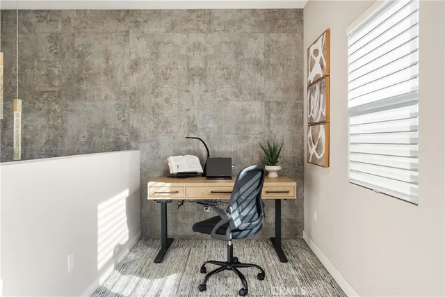 a view of balcony with furniture