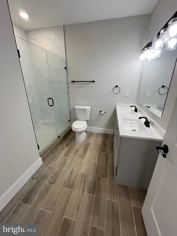 a bathroom with a sink and a toilet