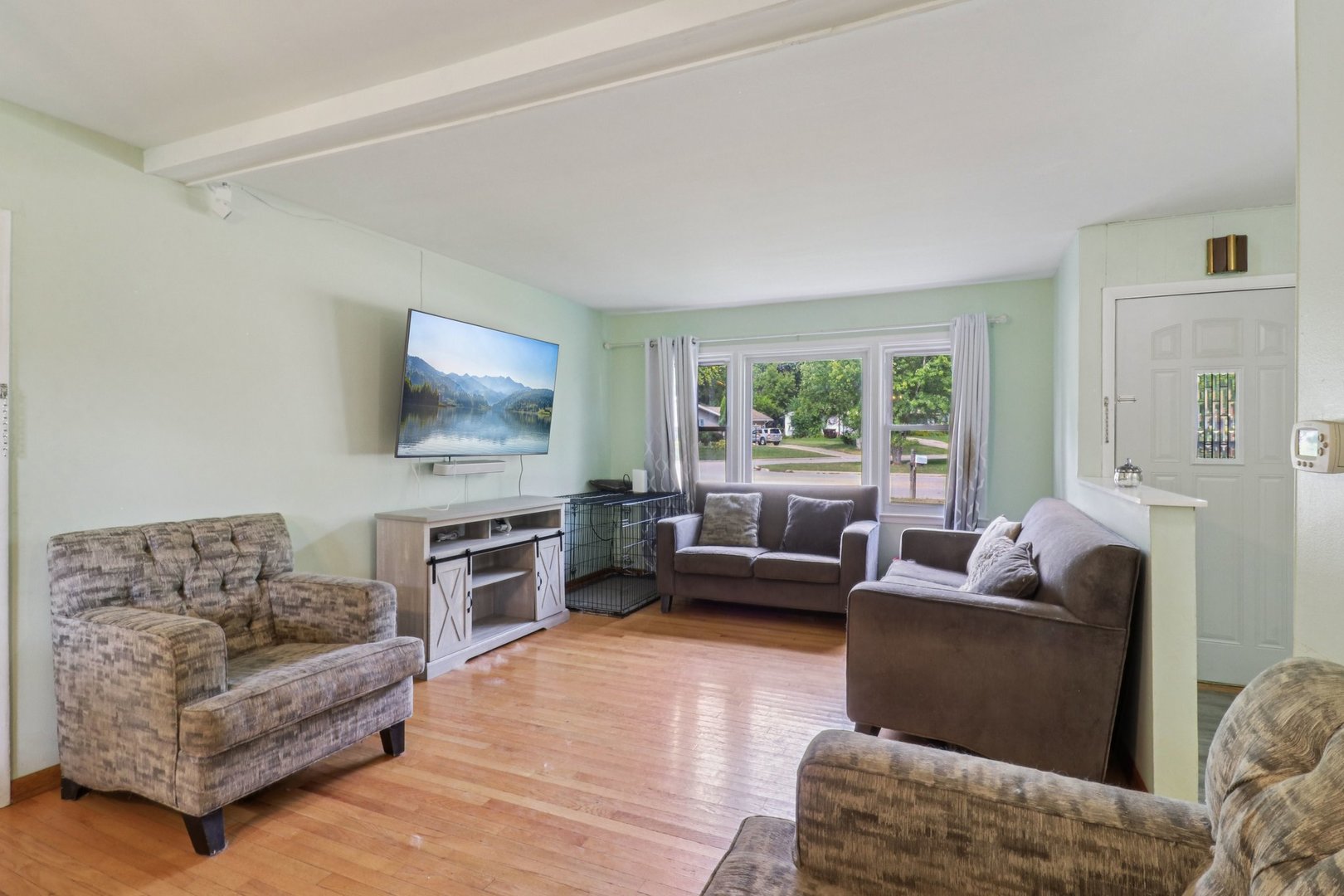 2610 Killarney Drive Cary, IL 60013 - Photo 7 of 15 a living room with furniture and a flat screen tv