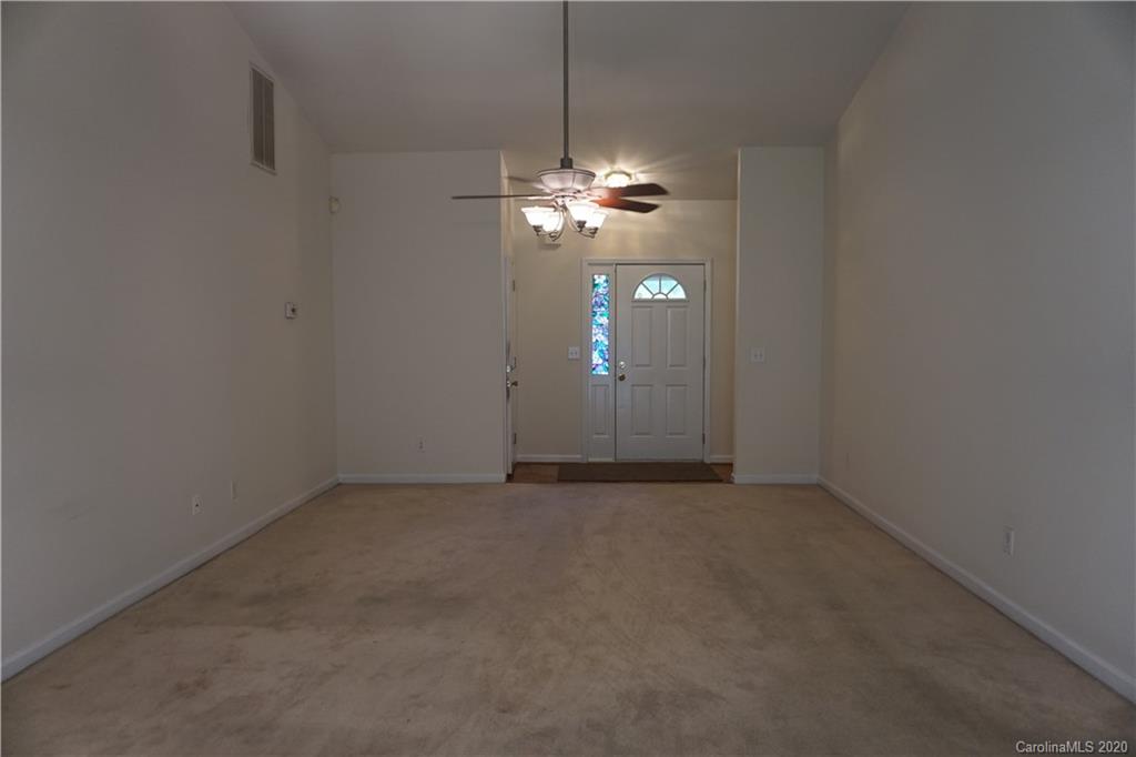 4121 Oakwood Road Charlotte, NC 28269 - Photo 2 of 15 a view of a chandelier fan in a room