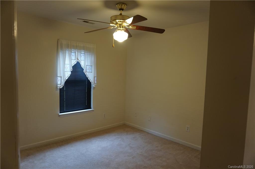 4121 Oakwood Road Charlotte, NC 28269 - Photo 11 of 15 a view of a workspace room with a window