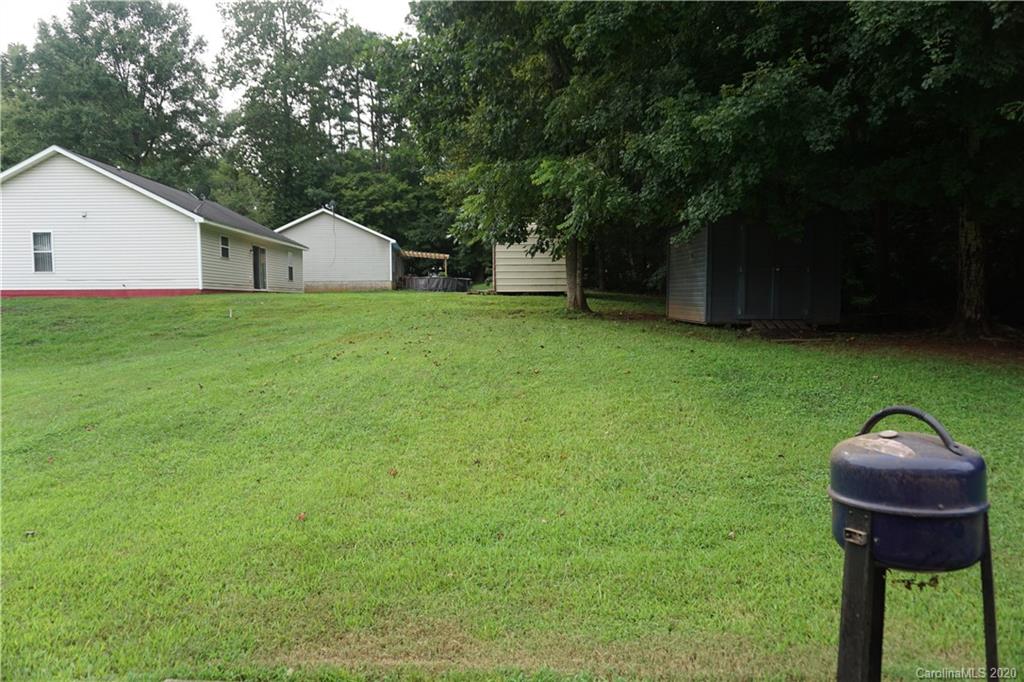 4121 Oakwood Road Charlotte, NC 28269 - Photo 14 of 15 a house view with a garden space