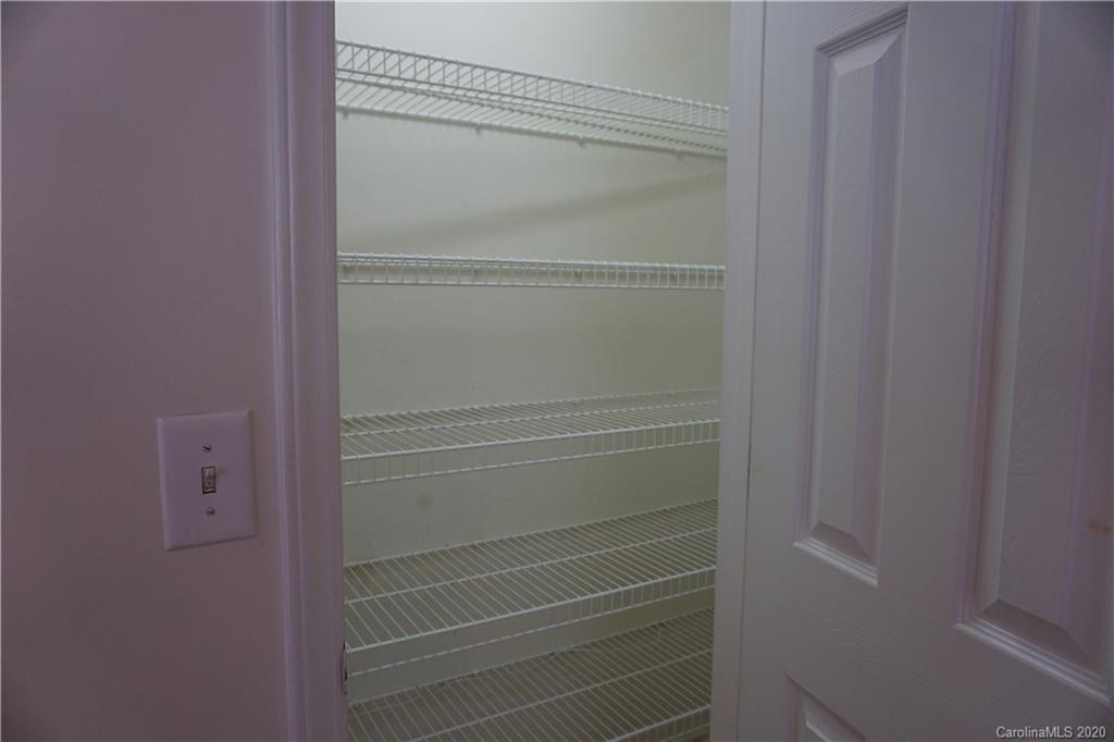 4121 Oakwood Road Charlotte, NC 28269 - Photo 4 of 15 a view of walk in closet