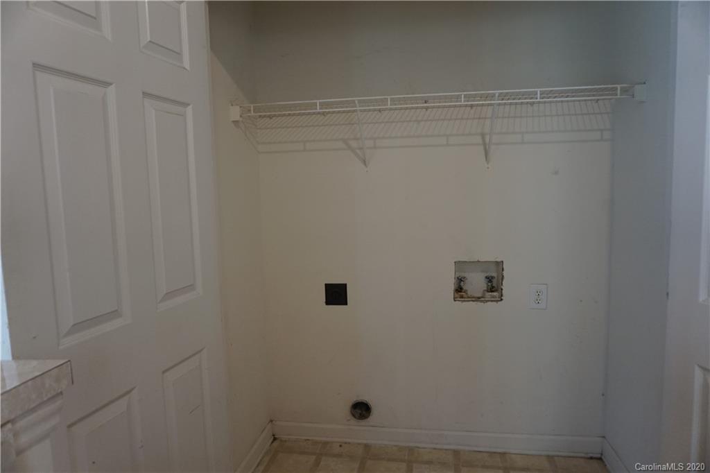 4121 Oakwood Road Charlotte, NC 28269 - Photo 9 of 15 a bathroom with a shower