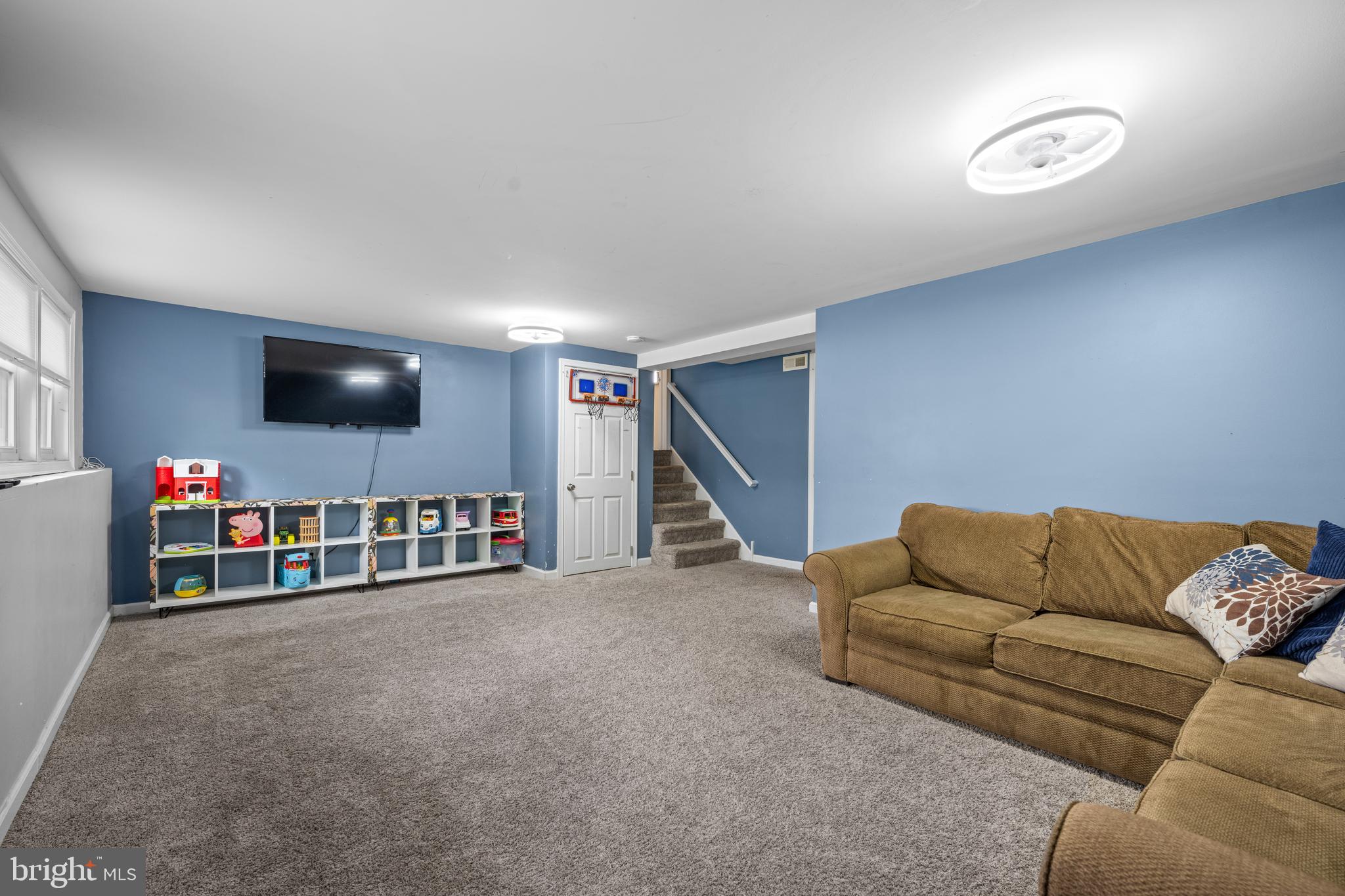 329 Sheffield Road Cherry Hill, NJ 08034 - Photo 12 of 30 a living room with furniture and a flat screen tv
