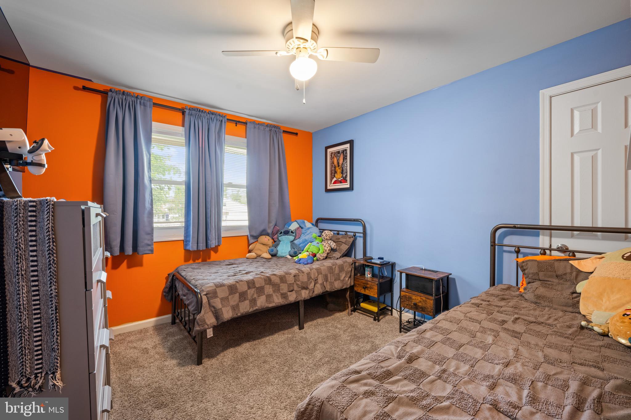 329 Sheffield Road Cherry Hill, NJ 08034 - Photo 17 of 30 a bedroom with two beds and next to a window