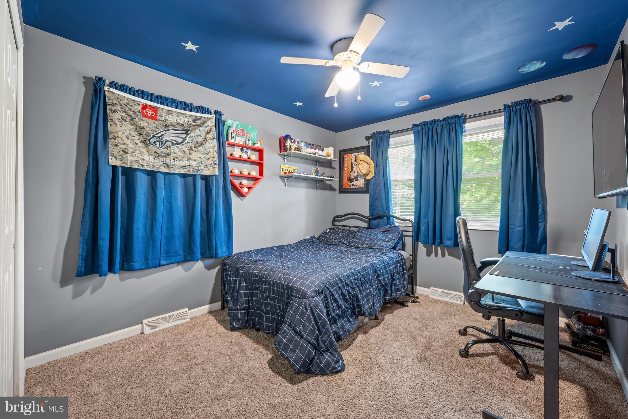 329 Sheffield Road Cherry Hill, NJ 08034 - Photo 18 of 30 a bedroom with a bed and a chandelier