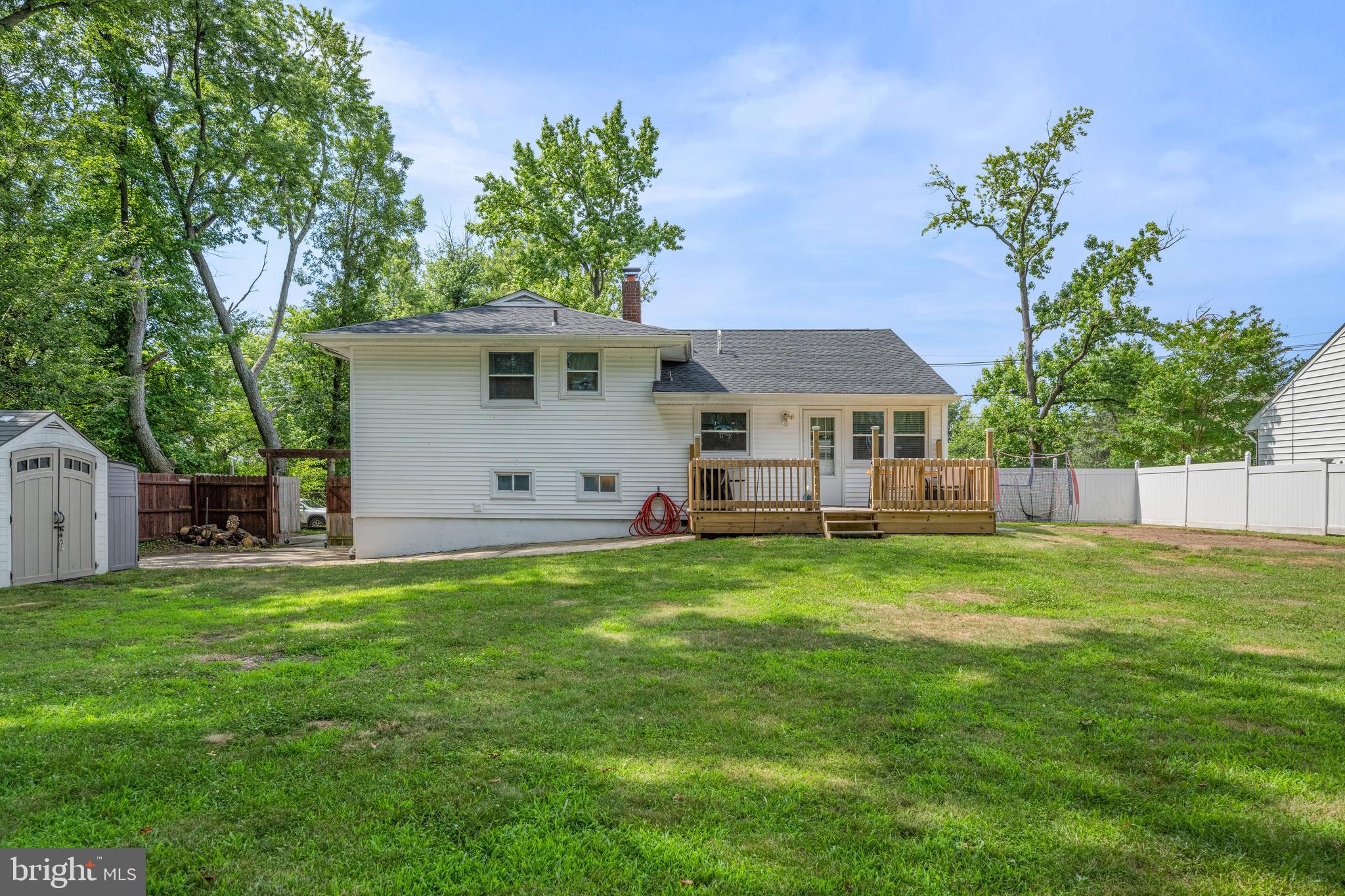 329 Sheffield Road Cherry Hill, NJ 08034 - Photo 25 of 30 a front view of a house with a garden