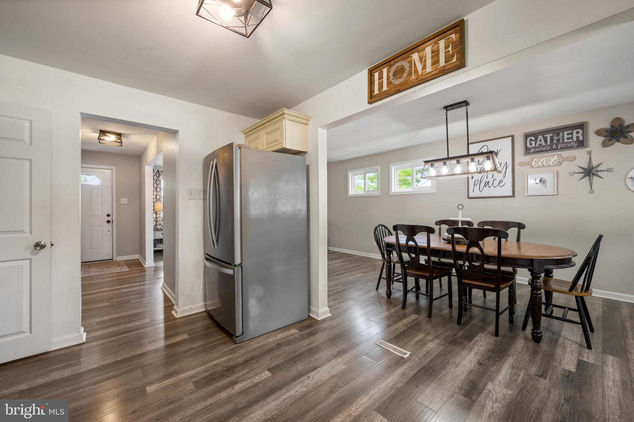 329 Sheffield Road Cherry Hill, NJ 08034 - Photo 7 of 30 a view of a dining room with furniture and wooden floor