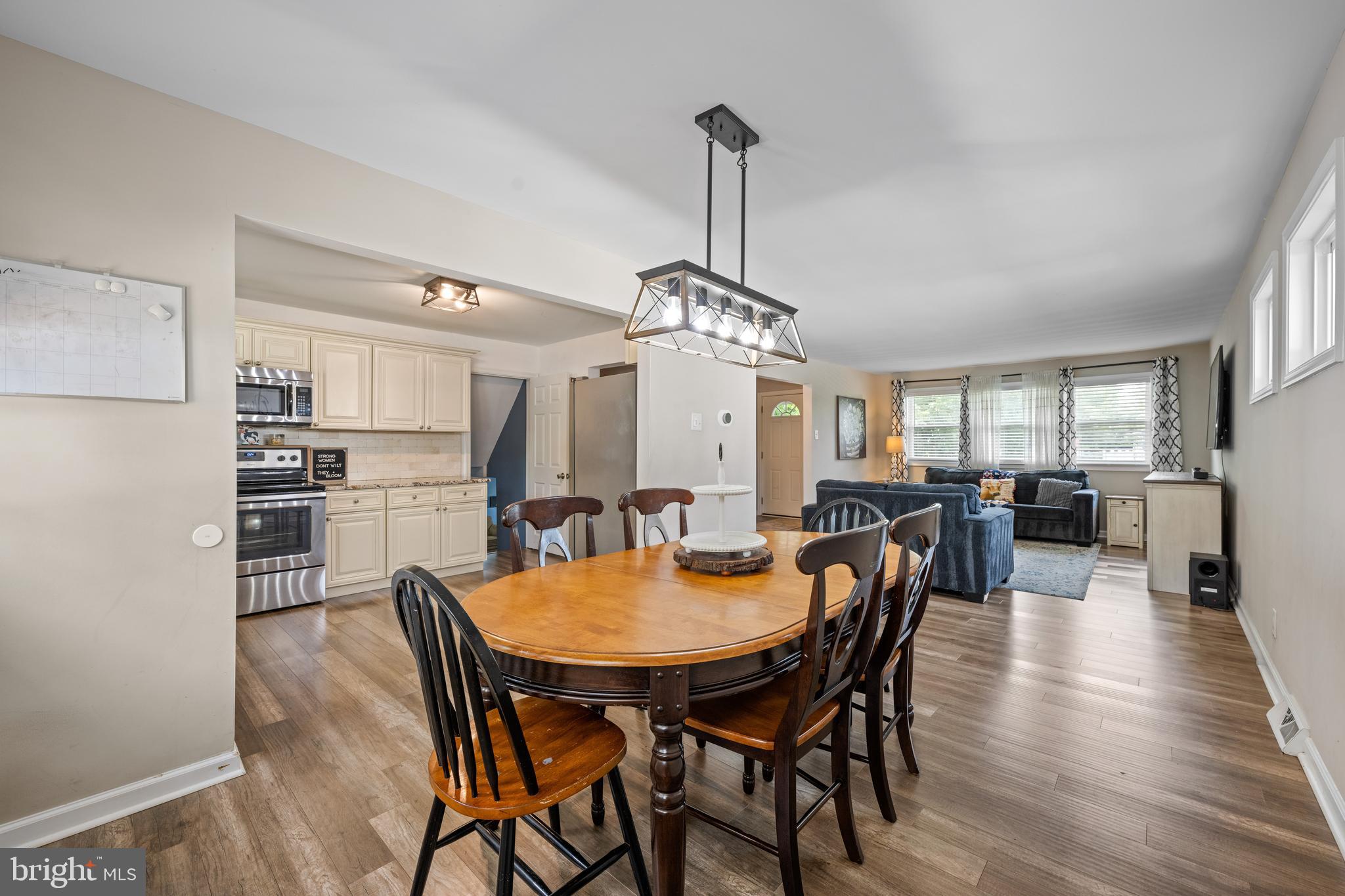 329 Sheffield Road Cherry Hill, NJ 08034 - Photo 8 of 30 a view of a dining room with furniture window and wooden floor