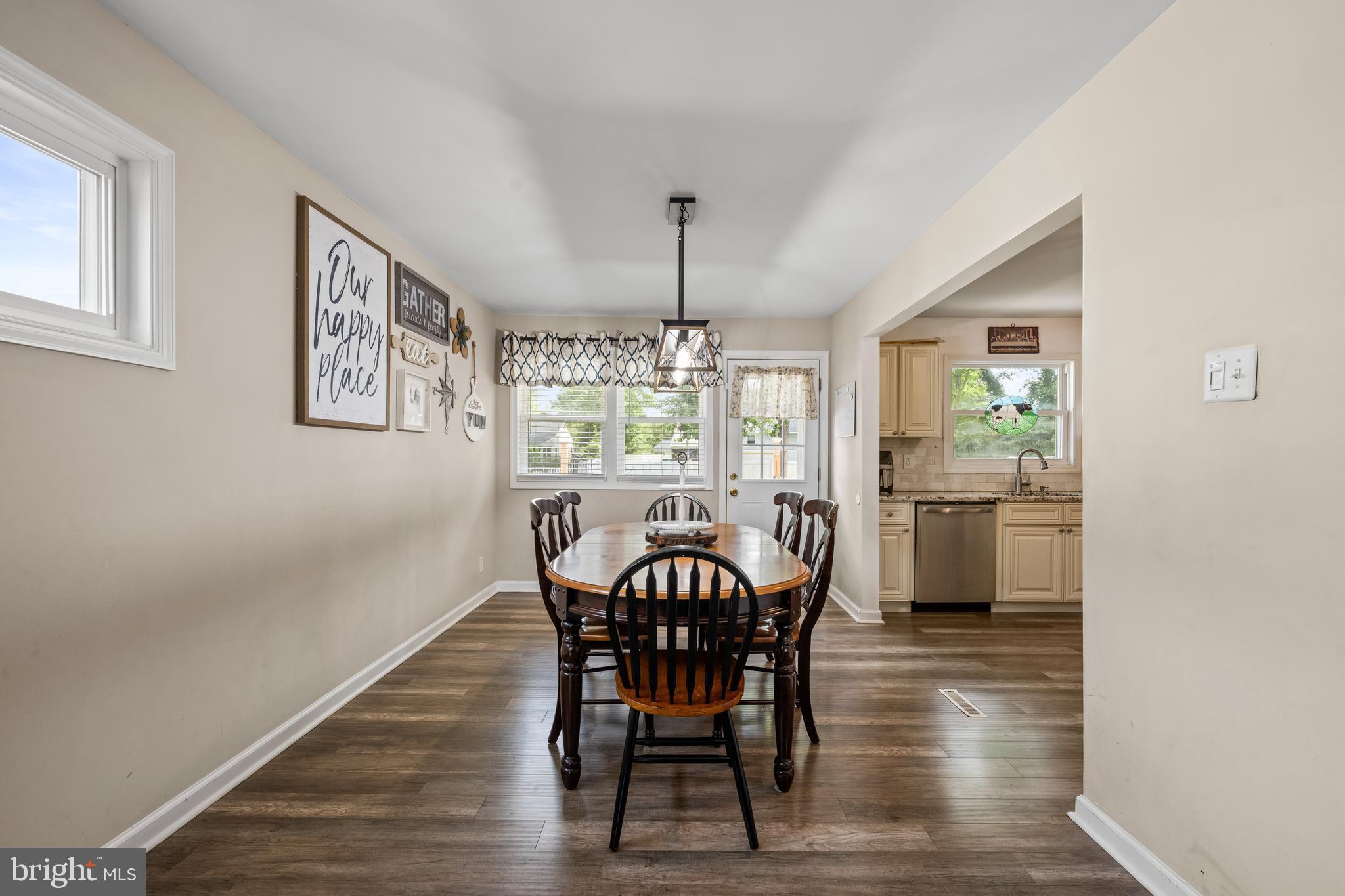 329 Sheffield Road Cherry Hill, NJ 08034 - Photo 9 of 30 a view of a dining room with furniture window and wooden floor