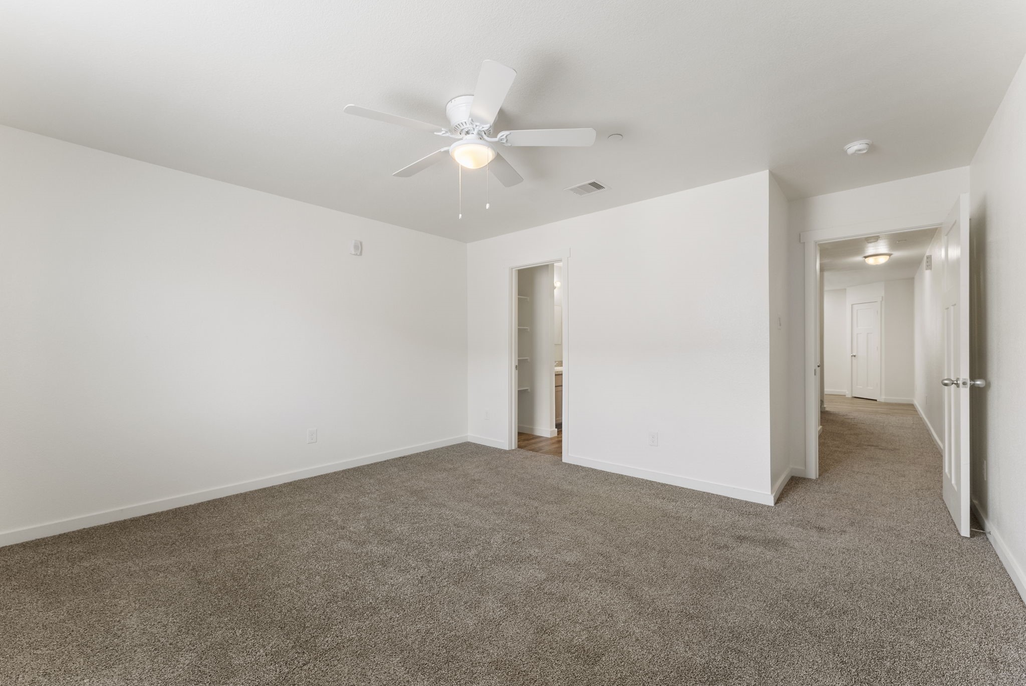 21155 Gosling Road, Unit 22AD Spring, TX 77388 - Photo 11 of 23 an empty room with fan and fan