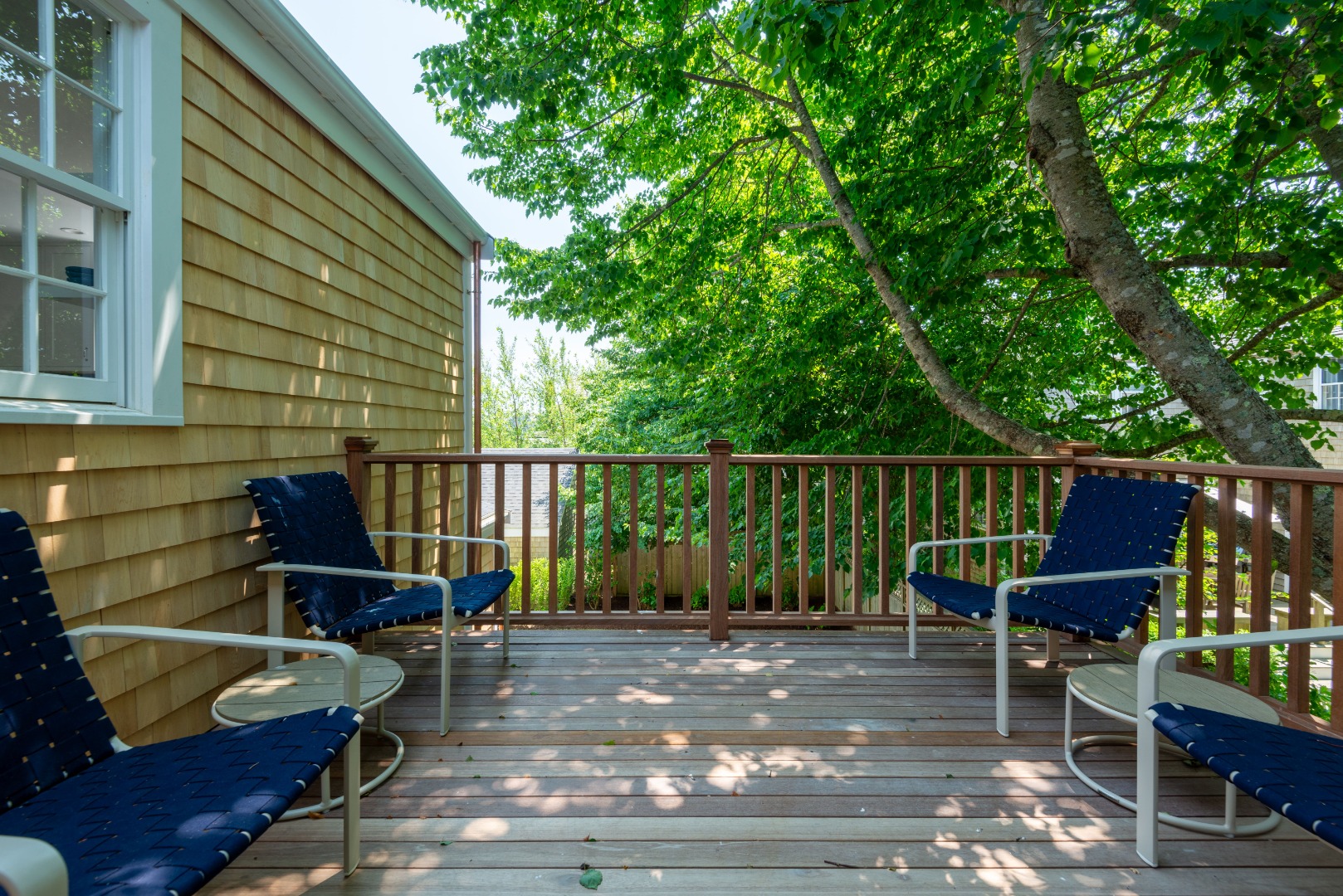 12 Willard Street Nantucket, MA 02554 - Photo 32 of 36 a balcony with wooden floor