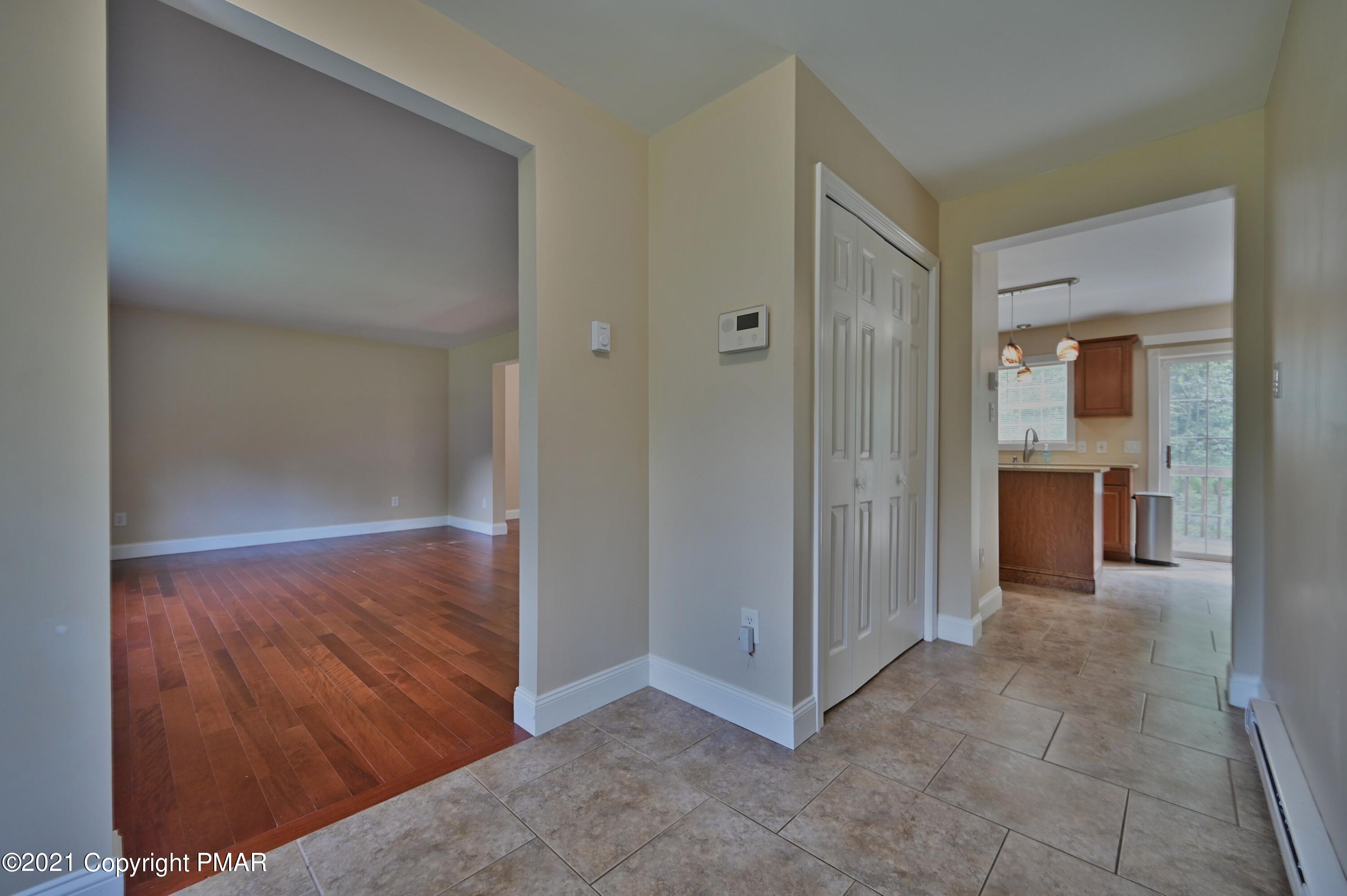 53 Seneca Road Mount Pocono, PA 18344 - Photo 8 of 41 a view of a hallway with wooden shelves