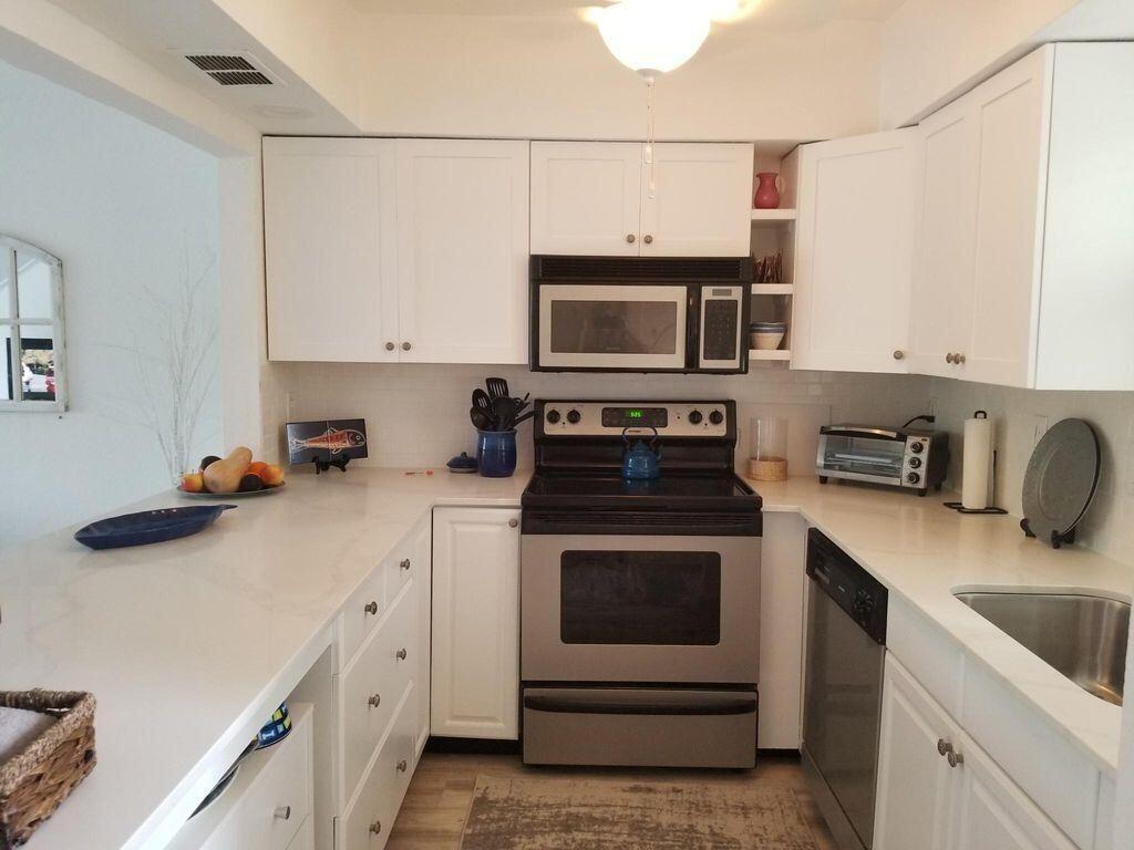 3139 Southeast Indian Street, Unit 7 Stuart, FL 34997 - Photo 5 of 18 Porcelain Counter Tops