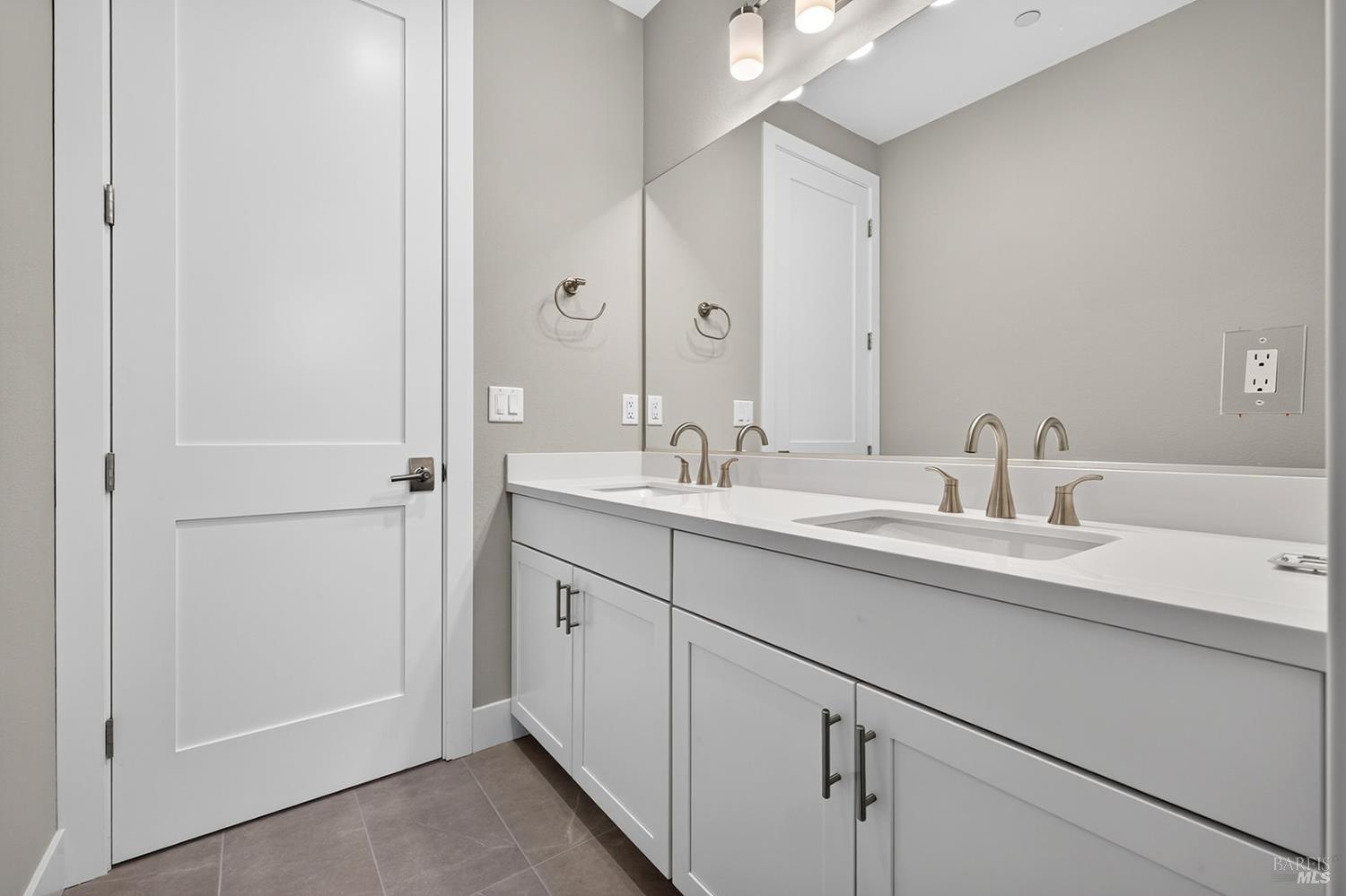 1913 Carlile Place Santa Rosa, CA 95403 - Photo 44 of 60 Upper-level bathroom also offers a dual sink vanity and quartz countertop.