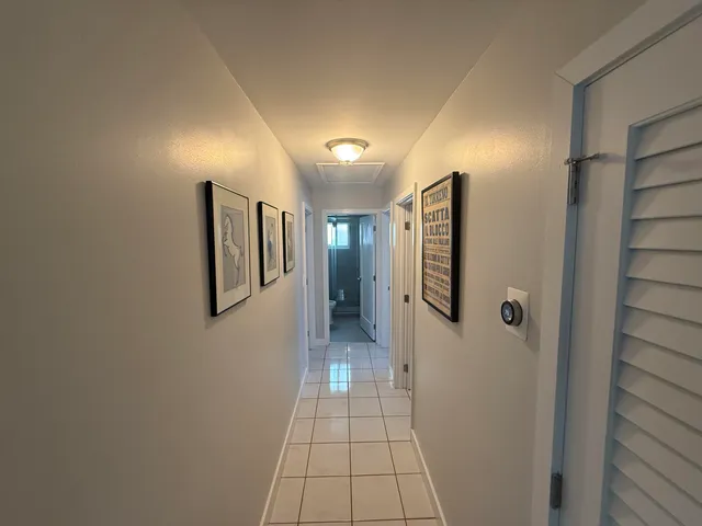 a work room with furniture and windows