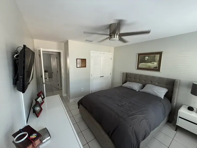 a bathroom with a shower and a toilet