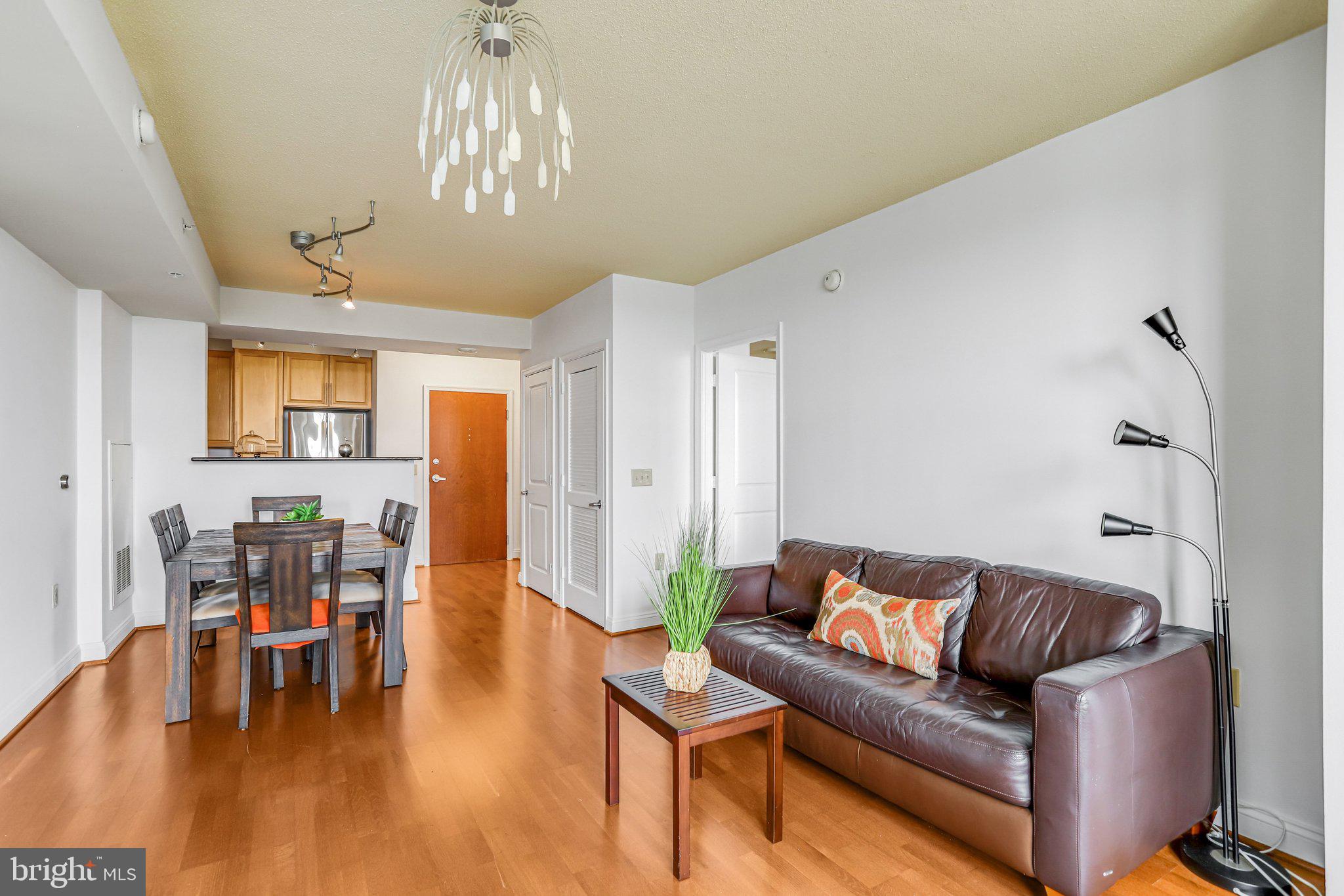 11760 Sunrise Valley Drive, Unit 415 Reston, VA 20191 - Photo 12 of 55 Living/Dining Room