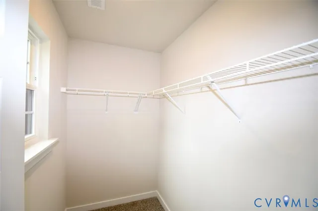 a view of a room with racks on the wall