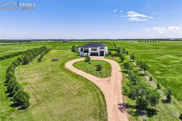 a house view with a swimming pool