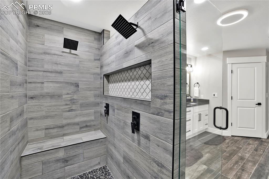 18135 Spur Ranch Road Peyton, CO 80831 - Photo 21 of 36 a bathroom with a shower