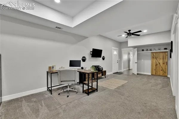 a view of workspace with livingroom