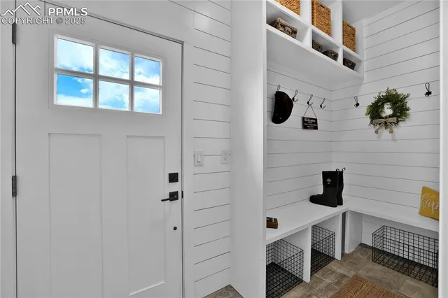 a bathroom with a toilet and shower